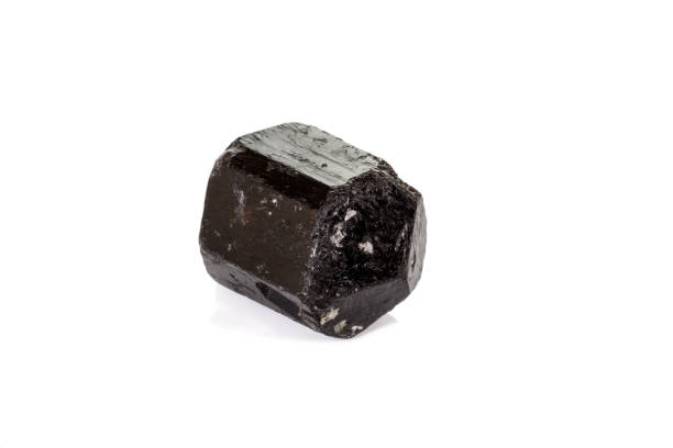 istock macro mineral stone schorl, black tourmaline on white background 1136683165