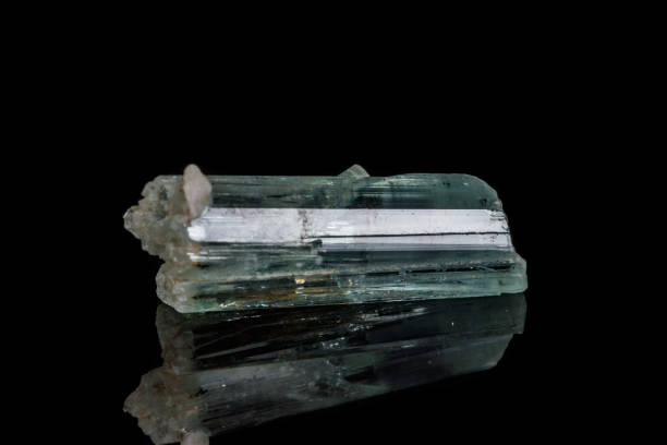 istock macro mineral stone aquamarine on a black background 1136683175