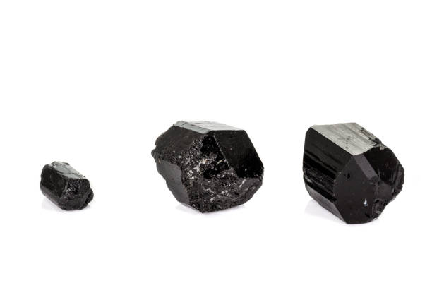 istock macro mineral stone schorl, black tourmaline on white background 1136683333