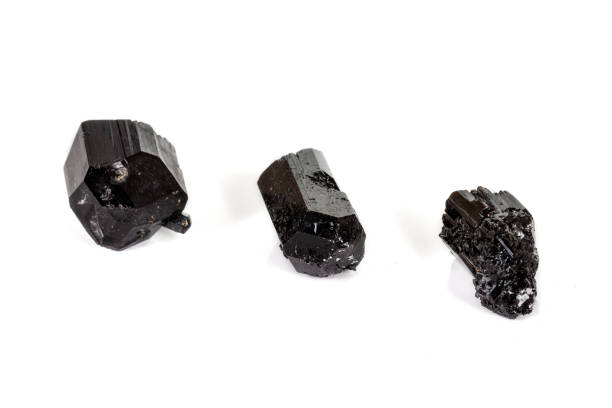 istock macro mineral stone schorl, black tourmaline on white background 1136683484