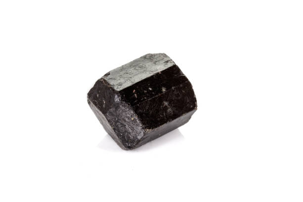 istock macro mineral stone schorl, black tourmaline on white background 1136684028