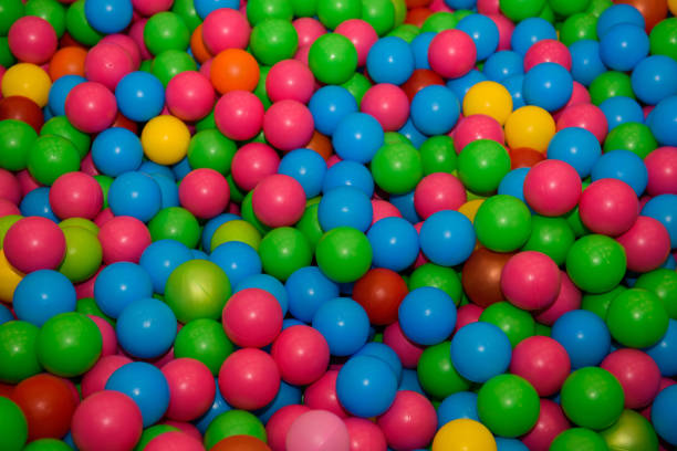 istock A lot of plastic colored balls. 1136684658