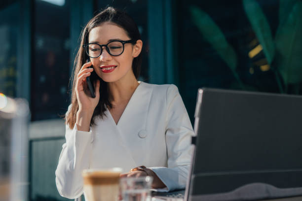 istock Pretty woman is using phone 1136686908