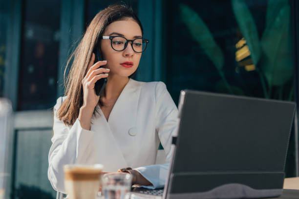 istock Young businesswoman is having a phone call 1136688291