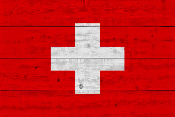 istock Switzerland flag painted on old wood plank 1136691385
