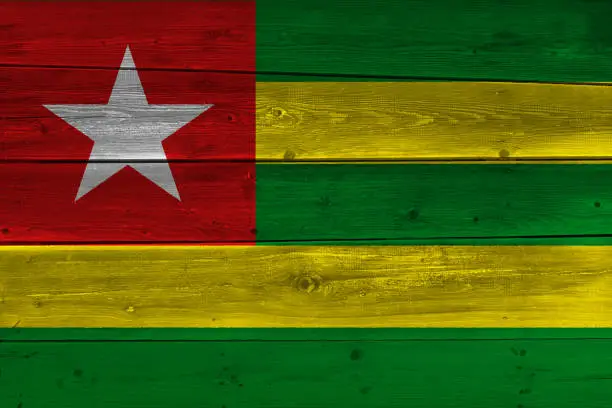 Photo of Togo flag painted on old wood plank