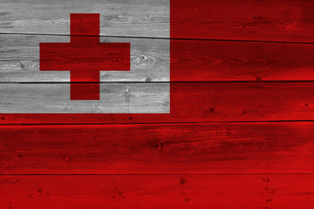 istock Tonga flag painted on old wood plank 1136691427
