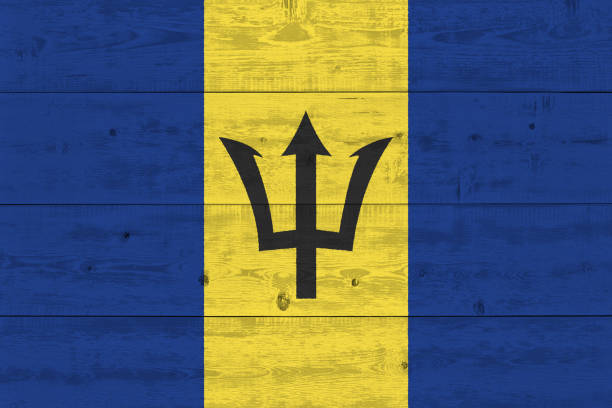 Barbados flag painted on old wood plank. Patriotic background. National flag of Barbados