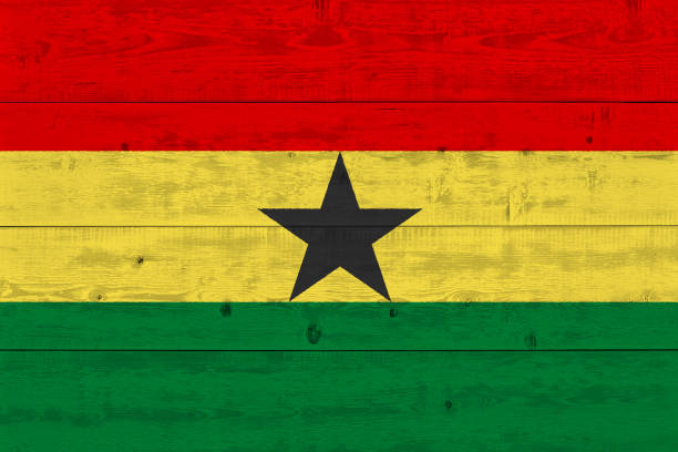 istock ghana flag painted on old wood plank 1136691561