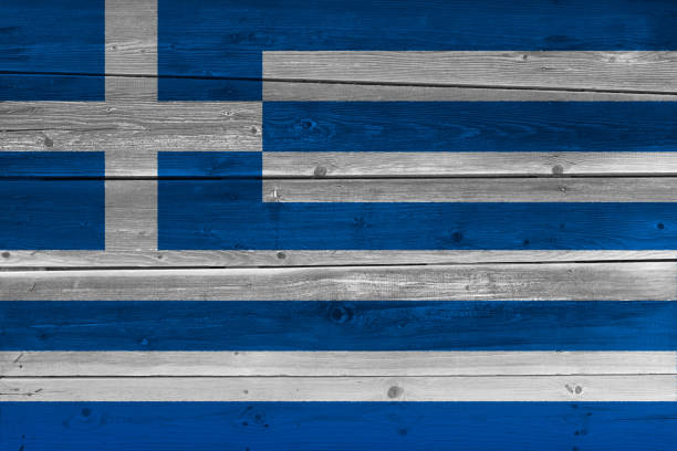 istock Greece flag painted on old wood plank 1136691564