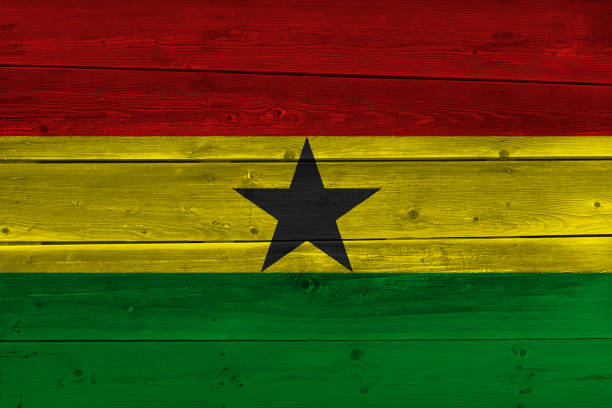 istock ghana flag painted on old wood plank 1136691570