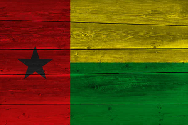 istock Guinea-Bissau flag painted on old wood plank 1136691574