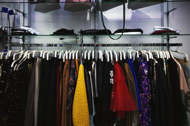istock New Colorful Clothes on Hangers 1136691678