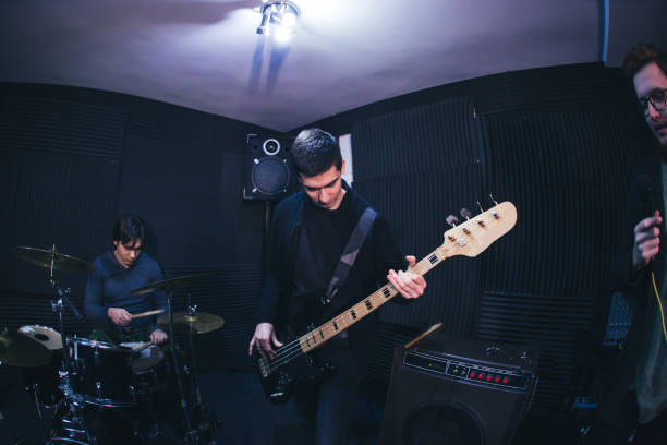 istock Guitarist playing in band 1136692792