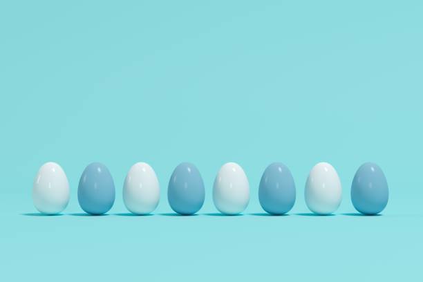 istock Row of white and blue eggs on light blue background. Minimal Easter idea. 1136693925