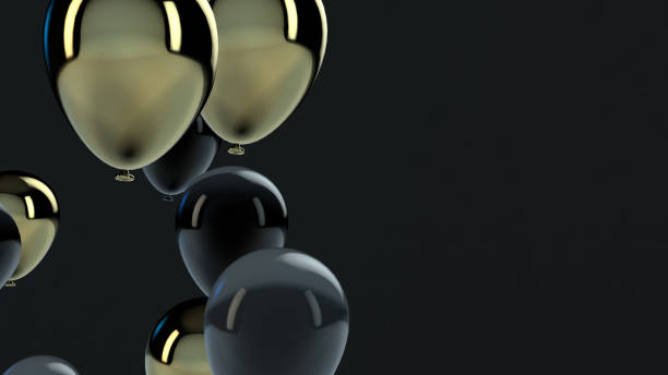istock Gold and Black balloon floating in the air 1136694007