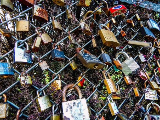 istock Love padlocks in fence from side 1136694299