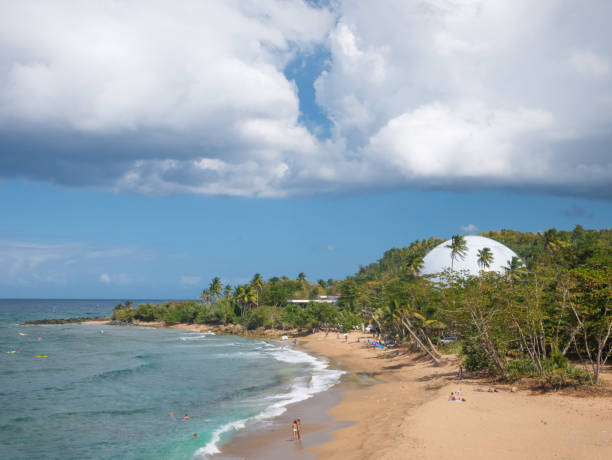 Domes Beach is on the northwest point of Puerto Rico, in Rincon and known for big wave surfing during the winter. Near the beach is a defunct nuclear facility. stock photo