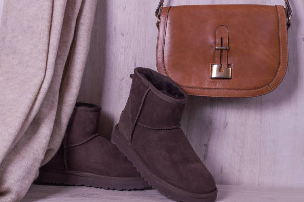 istock Female wardrobe, Womans scarf and boots. Fall clothes. 1136699312