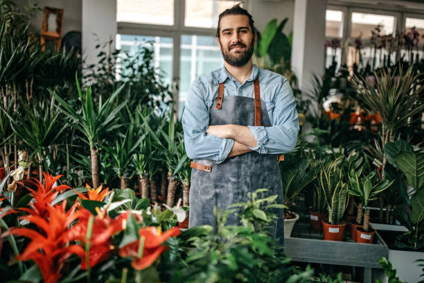 questo negozio è la mia vita - florist foto e immagini stock