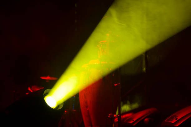 istock Lights on open air stage afternoon and evening, musical concert, powerful light visual impact color, visual technology in Latin America. 1136702966