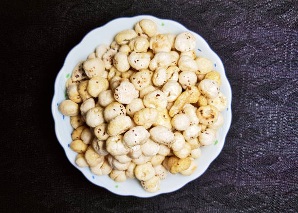 istock Fried and spicy makhana or lotus seeds 1136715285