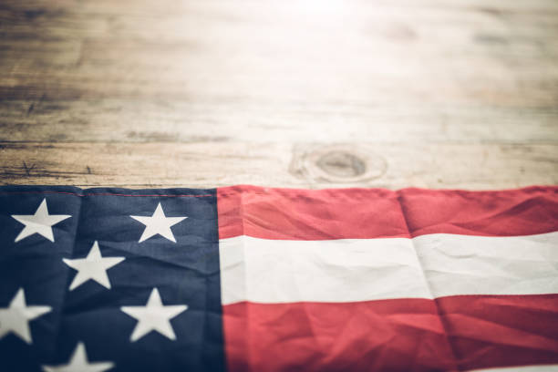 istock Part of Us flag on wood 1136717075