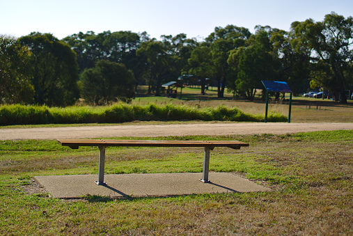 Empty bench in public park