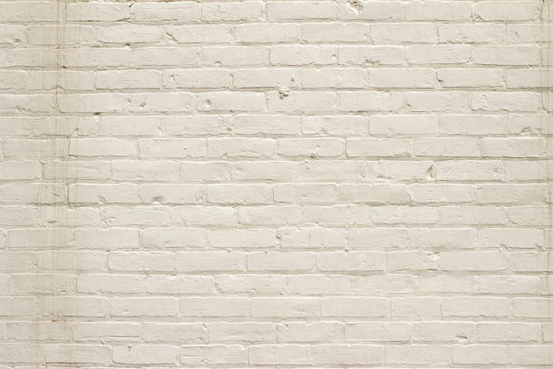istock Grungy old white painted brick wall abstract background 1136727113