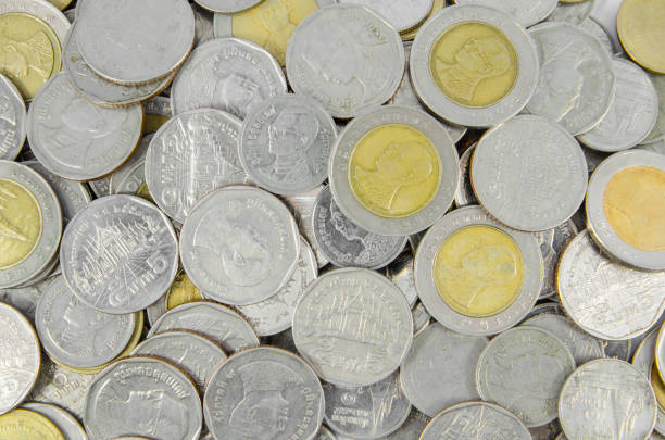 istock background of thai coin 1136729169