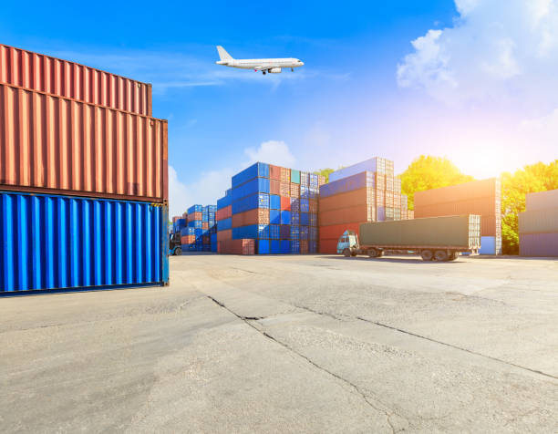 istock Containers stacked on commercial docks in Shanghai,modern logistics transportation scene 1136732331