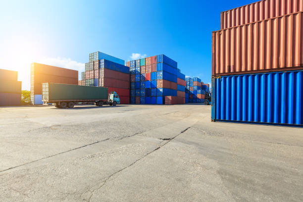 istock Containers stacked on commercial docks in Shanghai,modern logistics transportation scene 1136733012