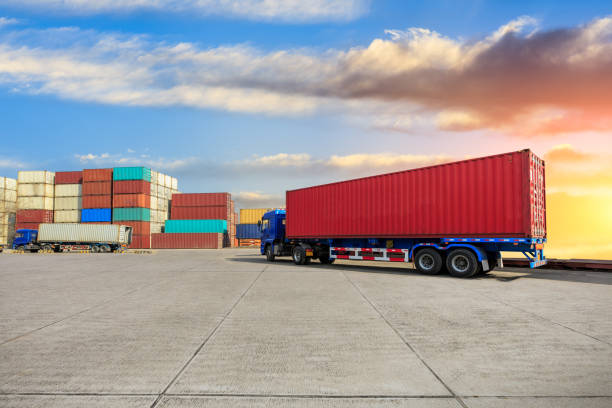 istock Containers stacked on commercial docks in Shanghai,modern logistics transportation scene 1136733116