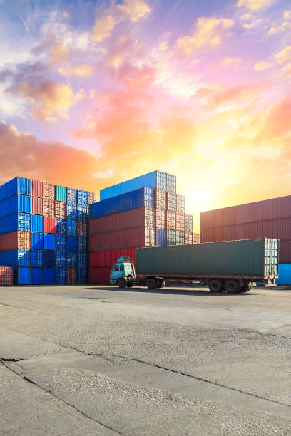 istock Containers stacked on commercial docks in Shanghai,modern logistics transportation scene 1136733117