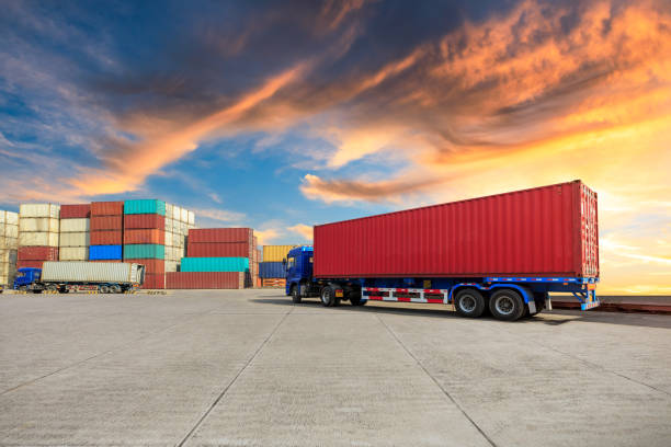istock Containers stacked on commercial docks in Shanghai,modern logistics transportation scene 1136733903