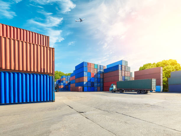 istock Containers stacked on commercial docks in Shanghai,modern logistics transportation scene 1136734072