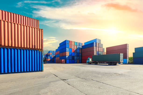 istock Containers stacked on commercial docks in Shanghai,modern logistics transportation scene 1136734168
