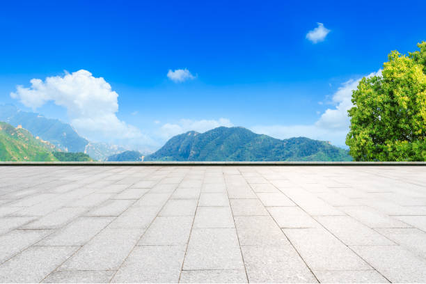 istock Empty square floor and green mountain natural landscape 1136734843
