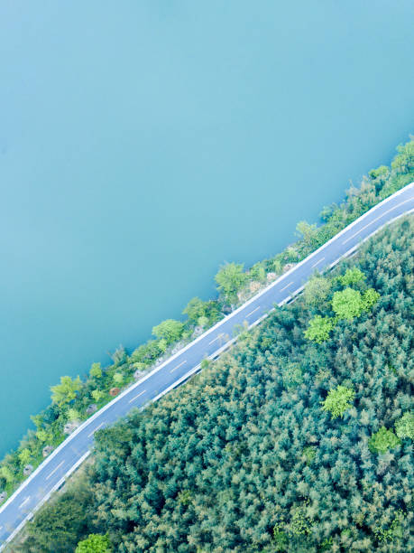 istock Highway beside the lake 1136734958
