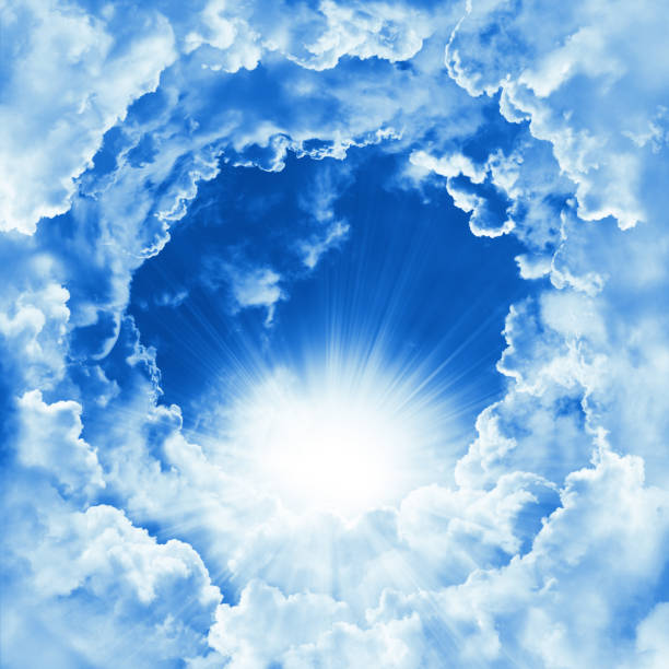 istock Religion concept of heavenly background. Divine shining heaven with dramatic clouds, light. Sky with beautiful cloud and sunshine. Sunny day. Peaceful nature sky background 1136735166
