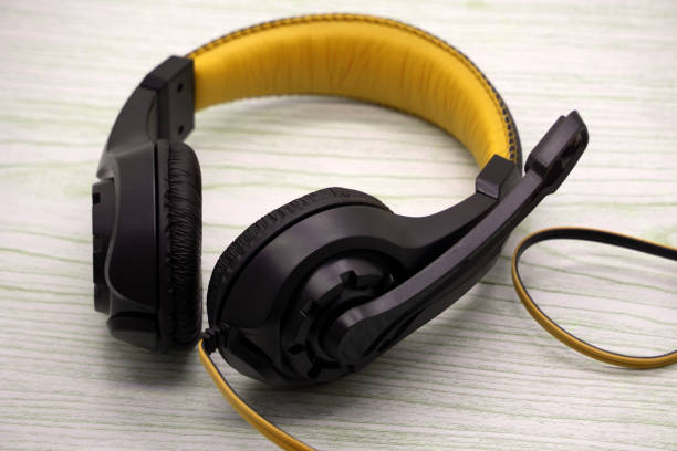istock Stylish modern headphones with earmuffs on white background . 1136736660