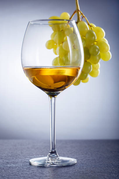 istock Glass of white wine and grapes. Alcohol concept. 1136737209