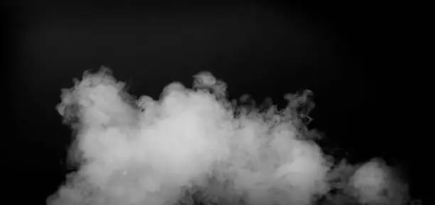 Photo of White smoke isolated on black background