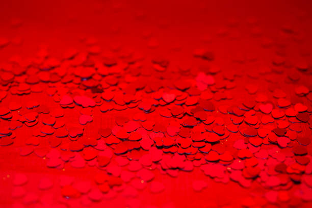 istock Red hearts confetti texture. Happy Valentines day background. 1136737785
