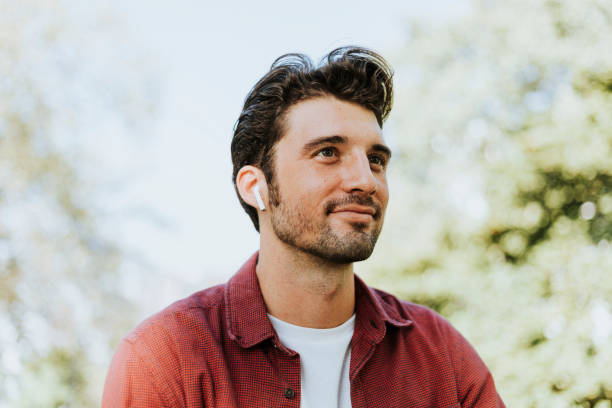 istock Music through a wireless earphone 1136752686