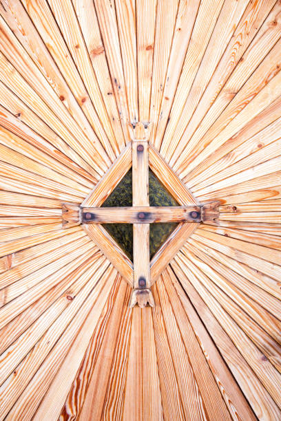 Wooden starburst background pattern door detail.