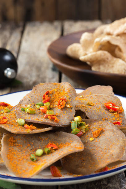 istock shrimp rice cracker in food Thai on wood 1136754048