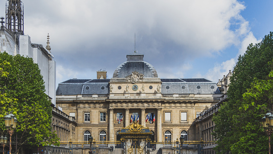 View of the front facade of Palais de Justice in Paris, France