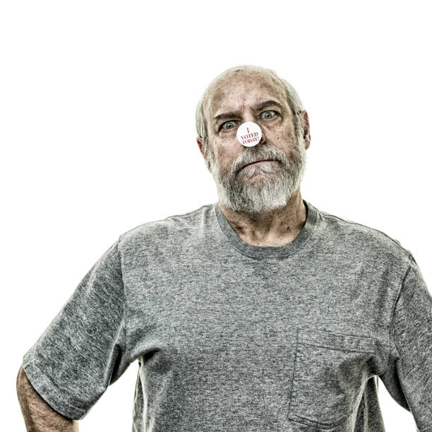 Mature businessman with an intense and aggressive expression is staring intently, conveying a sense of power and intimidation