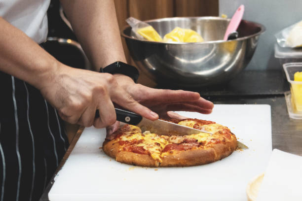 istock Chef preparing pizza , The process of making pizza 1136755509